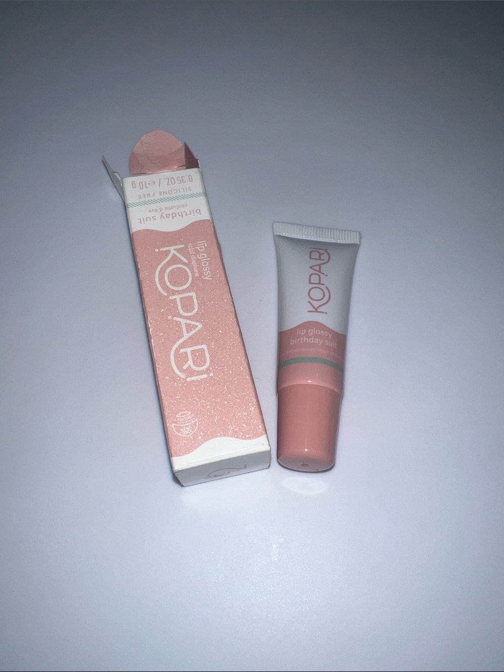 Kopari Lip Glossy Birthday Suit - Sheer Peach Pink Gloss